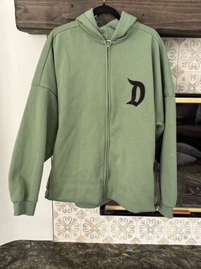 Disneyland Olive Green and black zip up hoodie